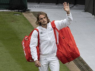 Tsitsipas and Kvitova fall as...